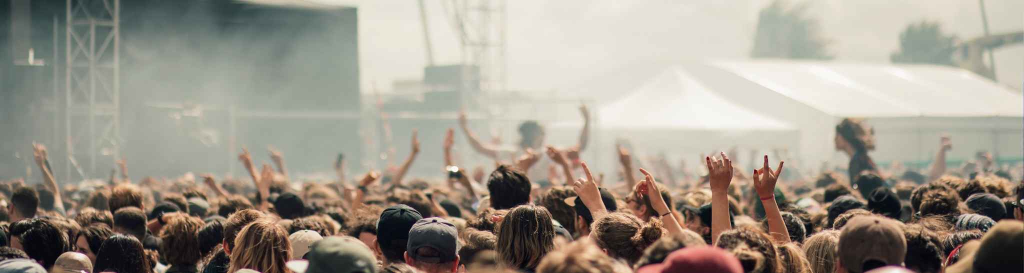 photo: crowd of young people in front of the music stage
