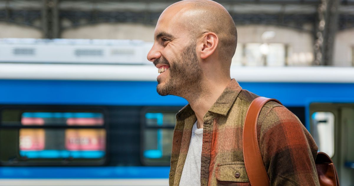 How long does it take to travel to Wałbrzych by train? Find out the real travel time Man at the station